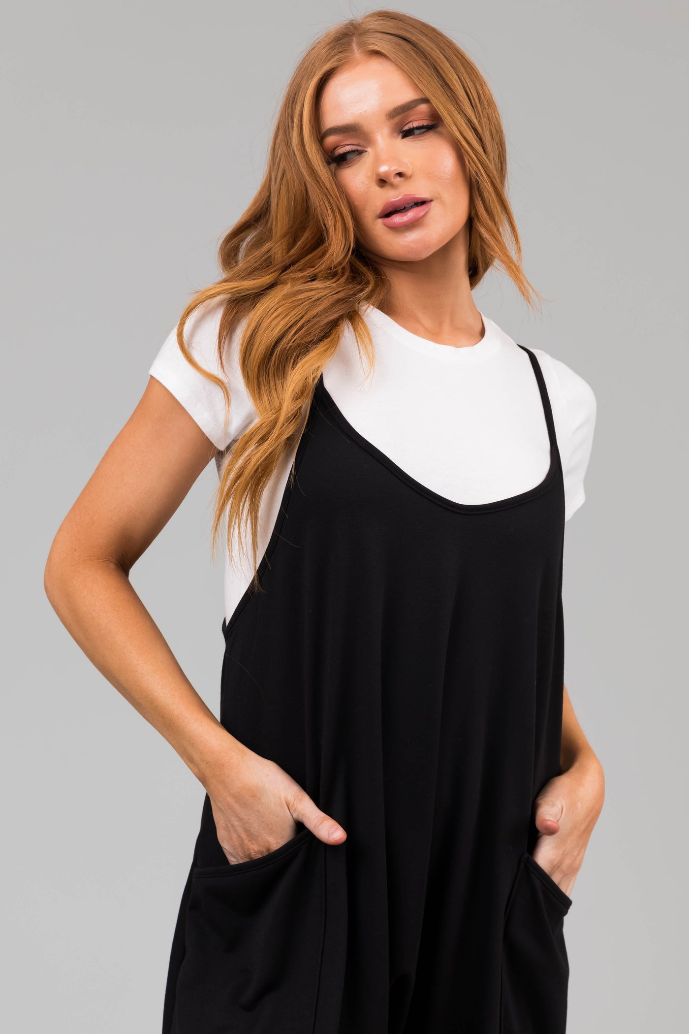 Black Sleeveless Front Pocket Loose Jumpsuit