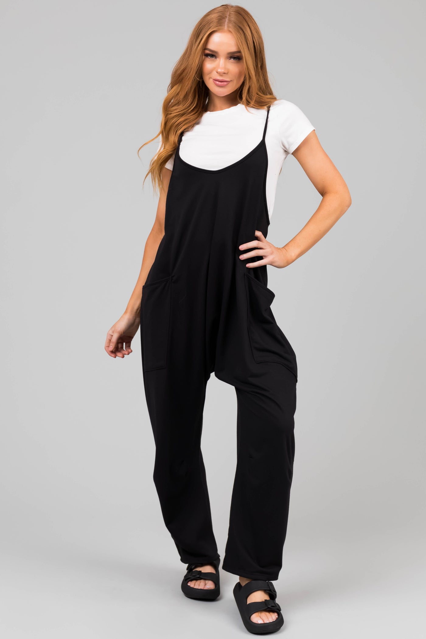 Black Sleeveless Front Pocket Loose Jumpsuit