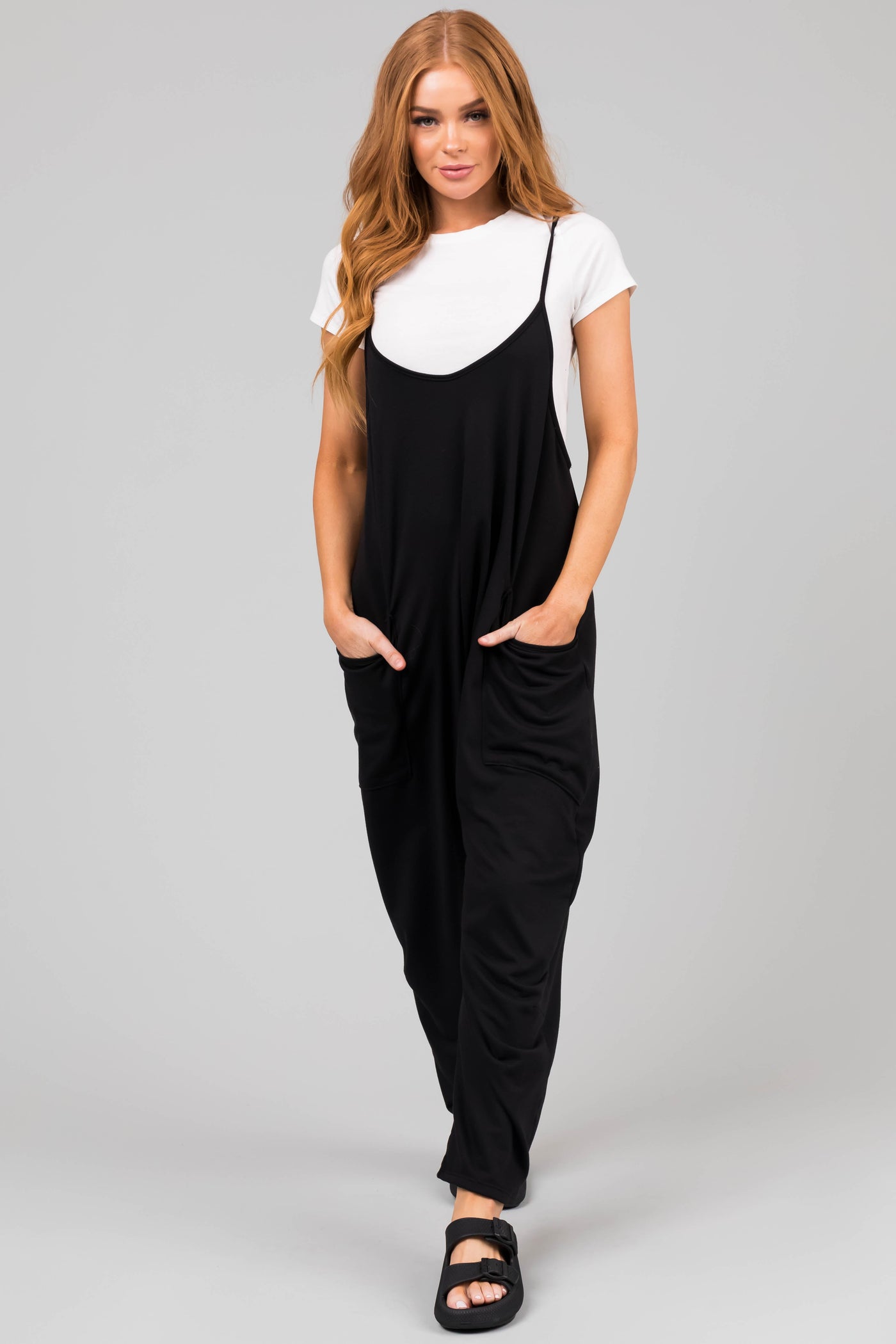 Black Sleeveless Front Pocket Loose Jumpsuit