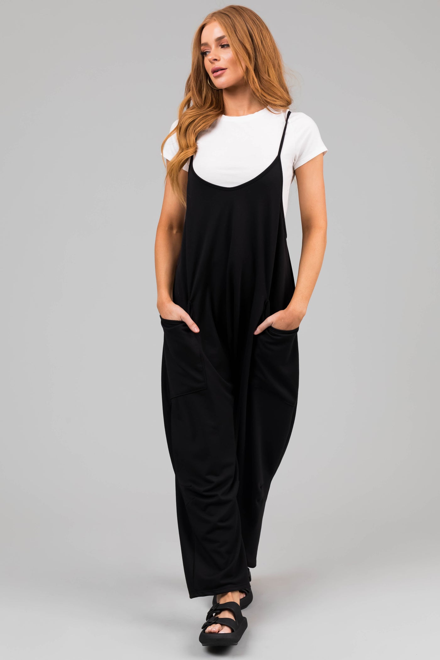 Black Sleeveless Front Pocket Loose Jumpsuit