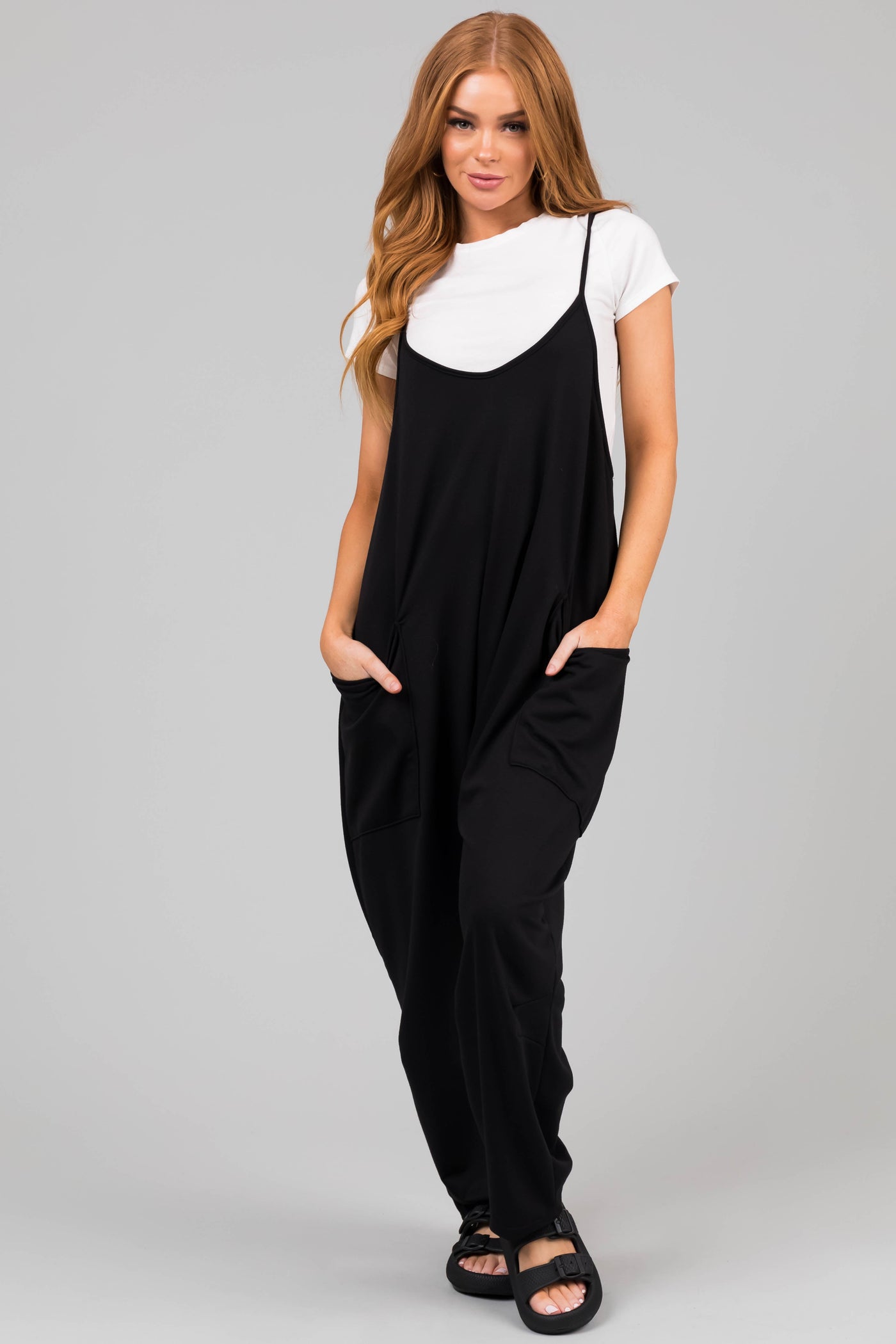 Black Sleeveless Front Pocket Loose Jumpsuit