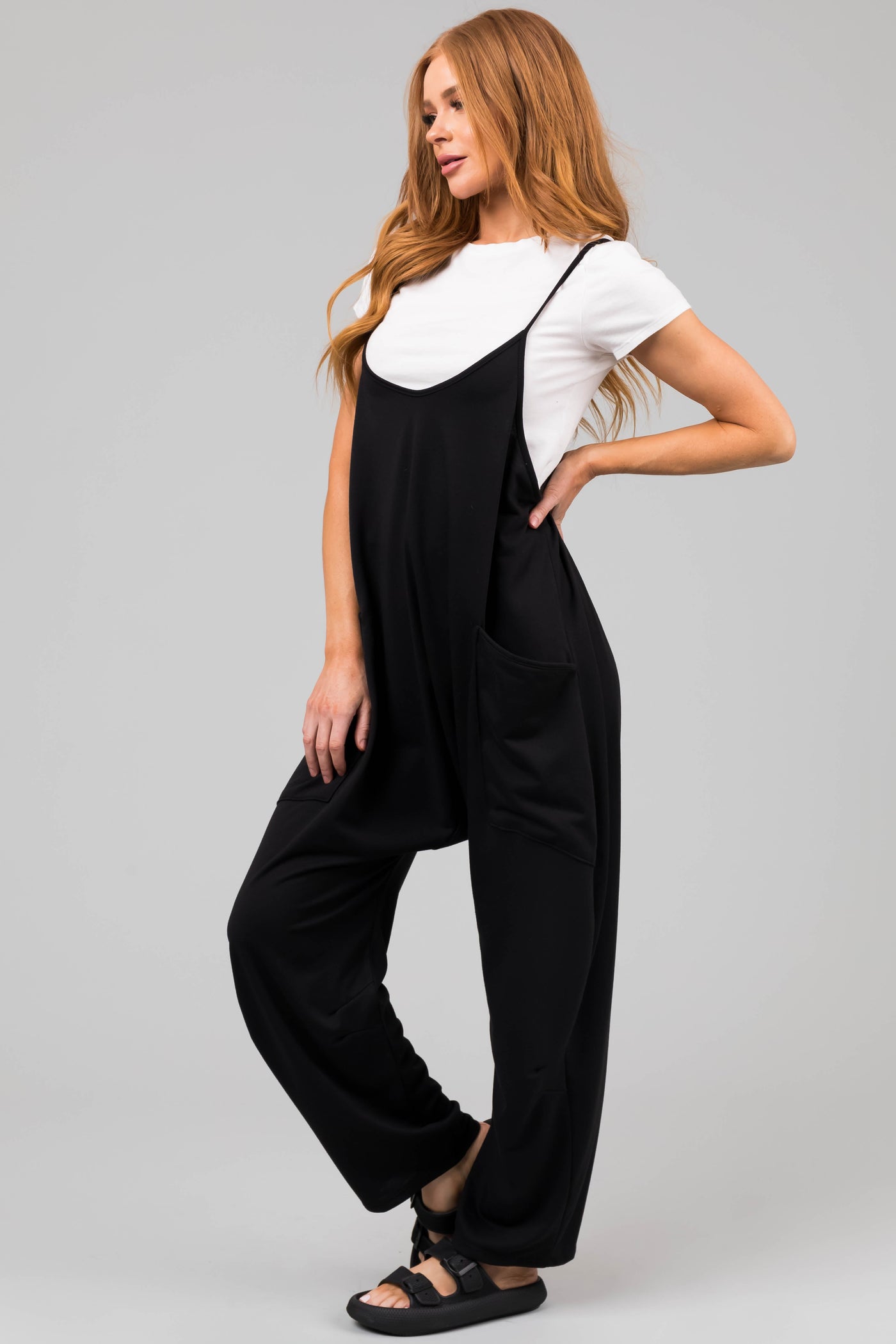 Black Sleeveless Front Pocket Loose Jumpsuit
