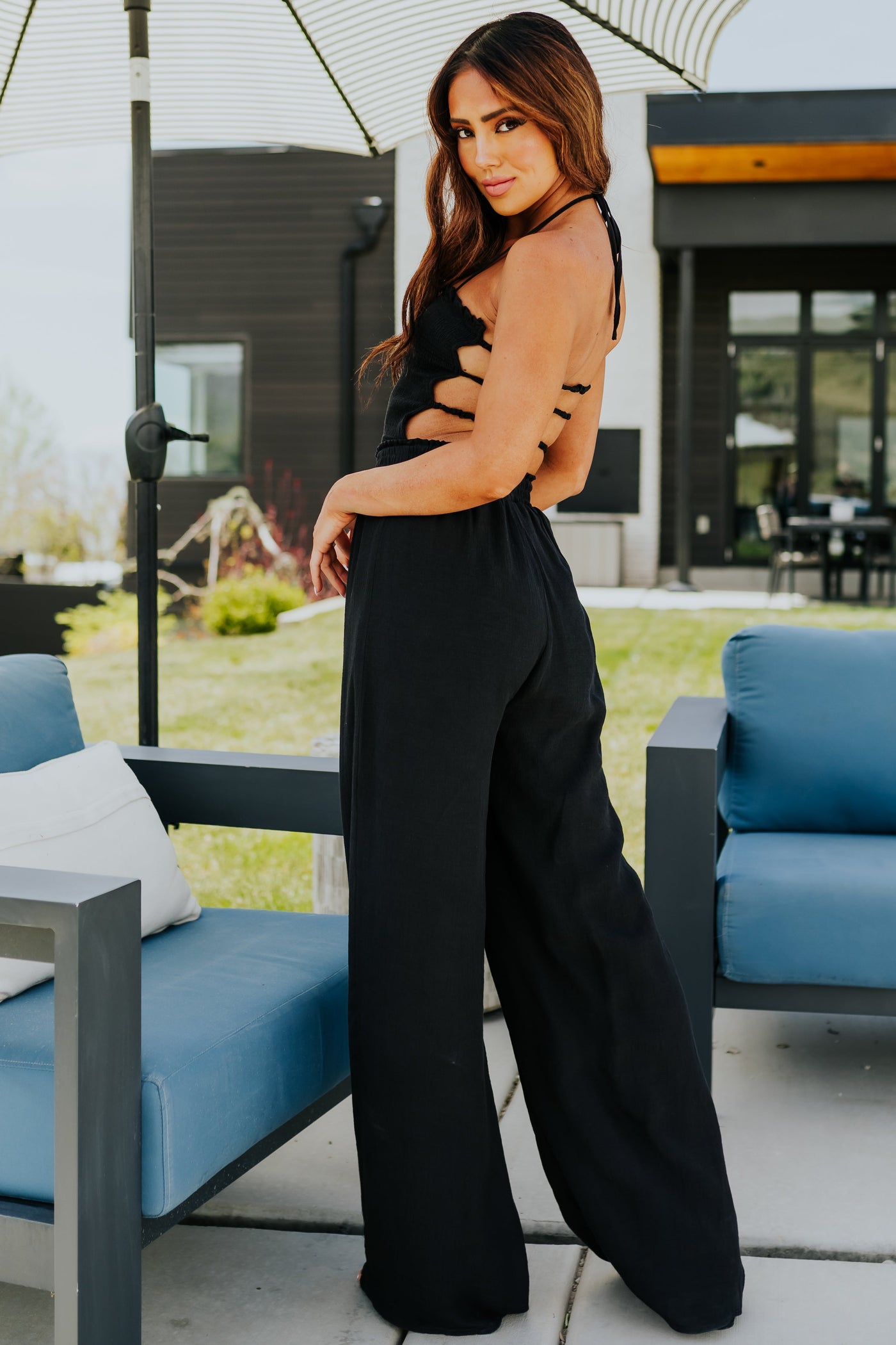 Black Smocked Halter Neck Woven Jumpsuit