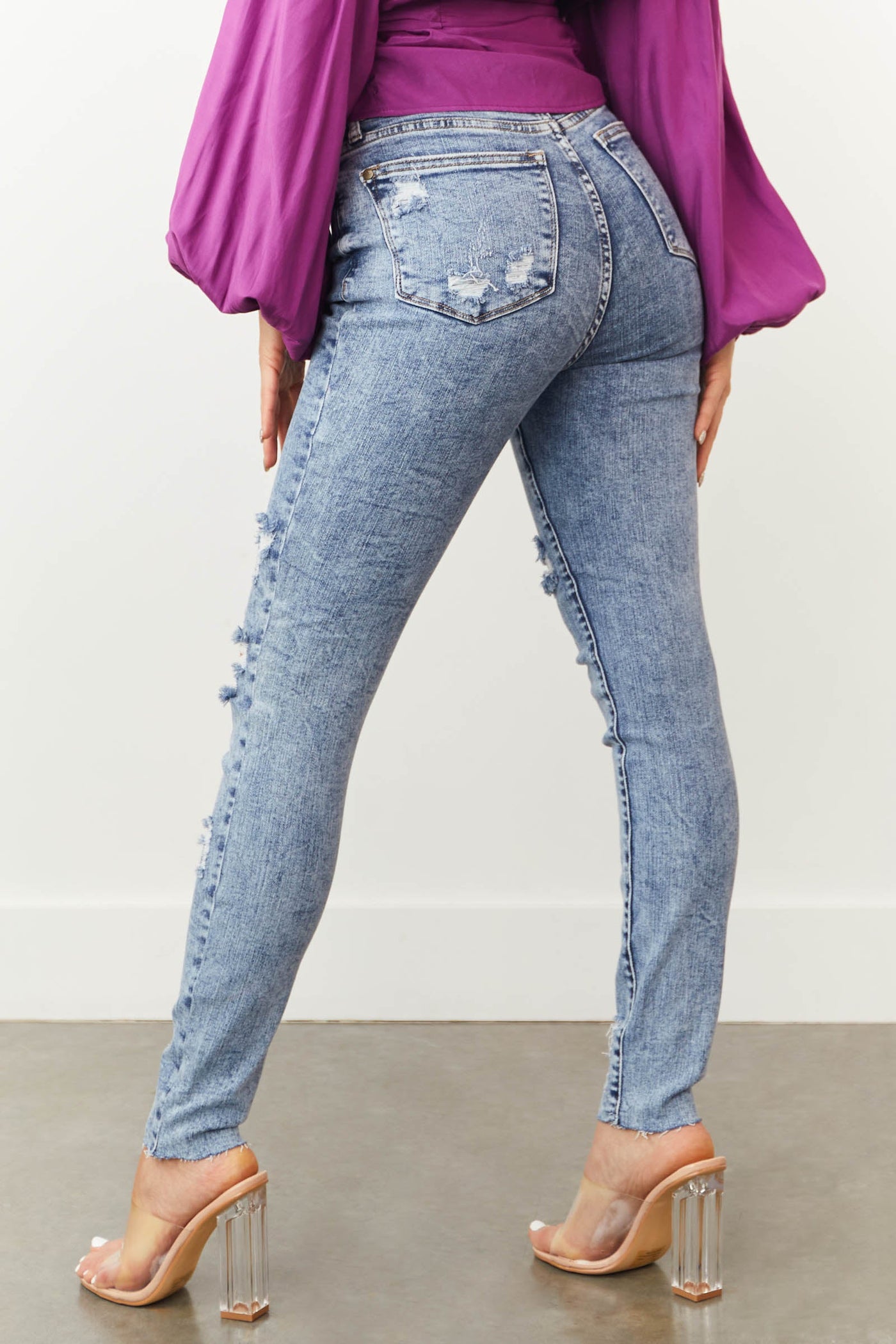 Light Acid Wash High Rise Torn Skinny Jeans