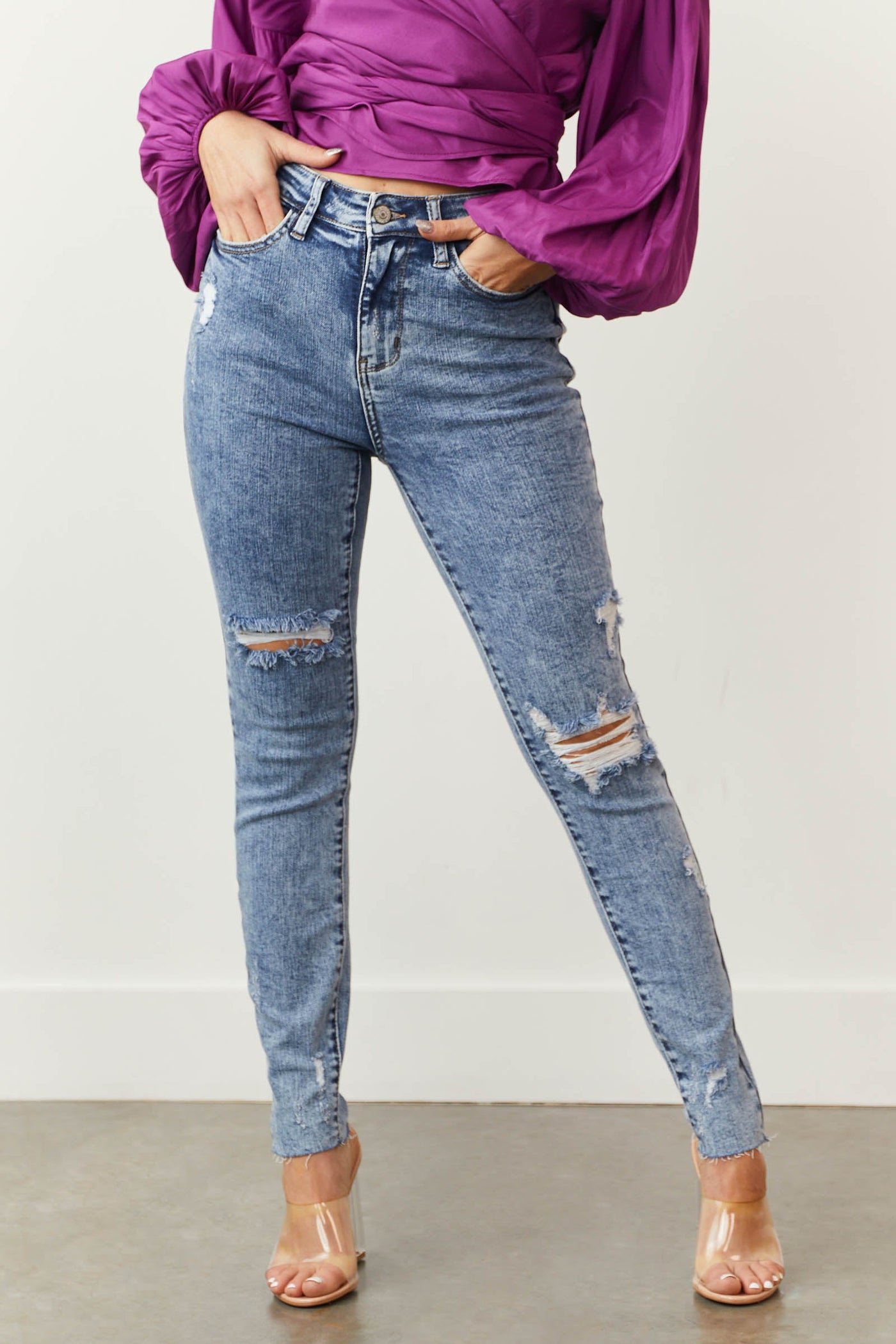 Light Acid Wash High Rise Torn Skinny Jeans