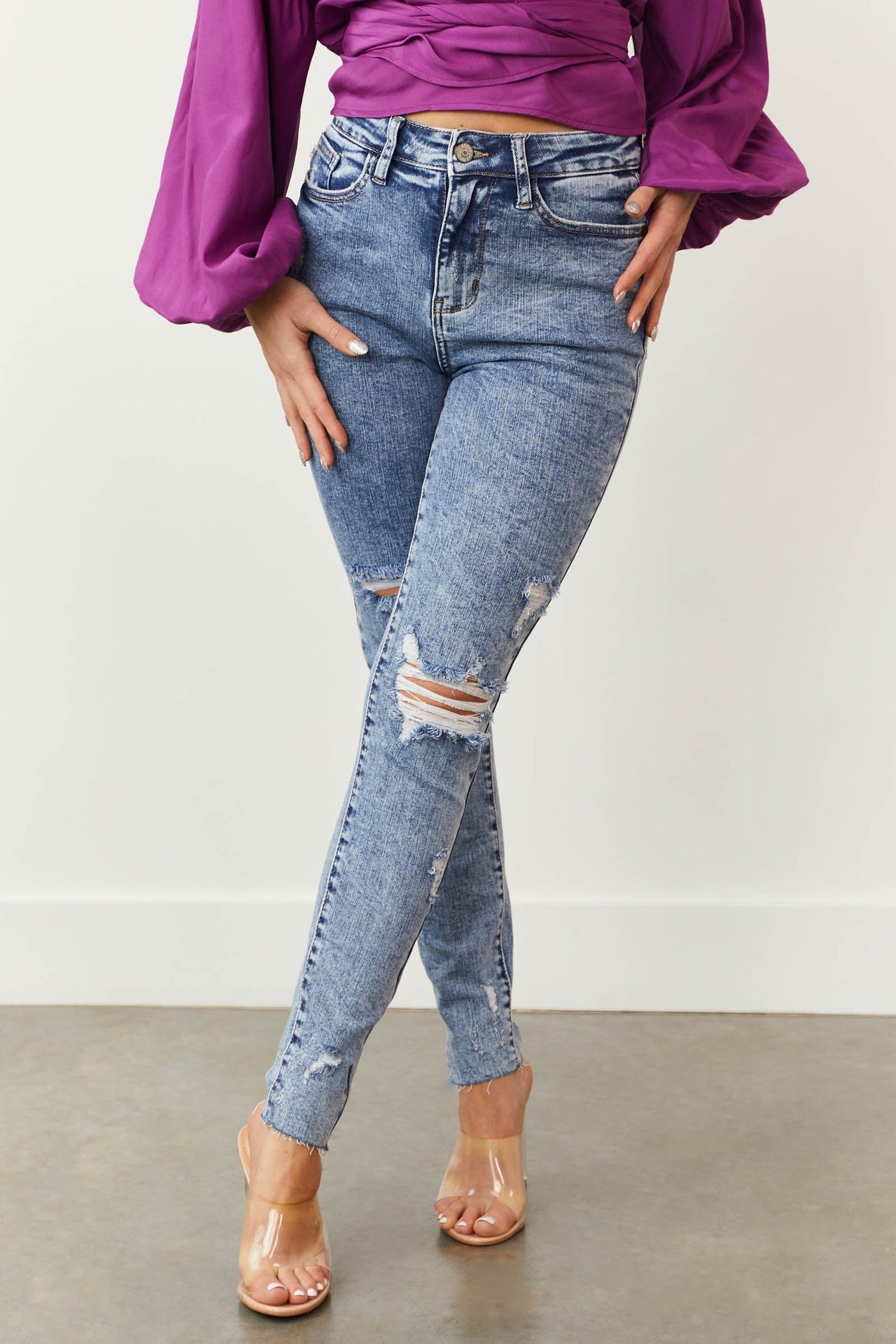Light Acid Wash High Rise Torn Skinny Jeans