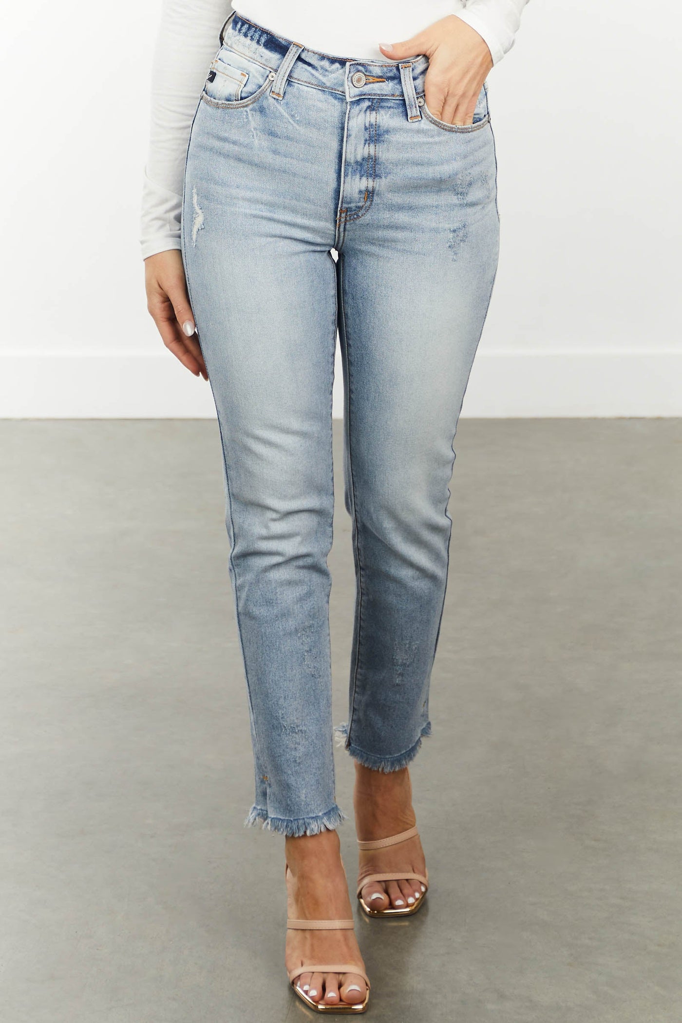 Light Wash Straight Leg Jeans with Frayed Hem
