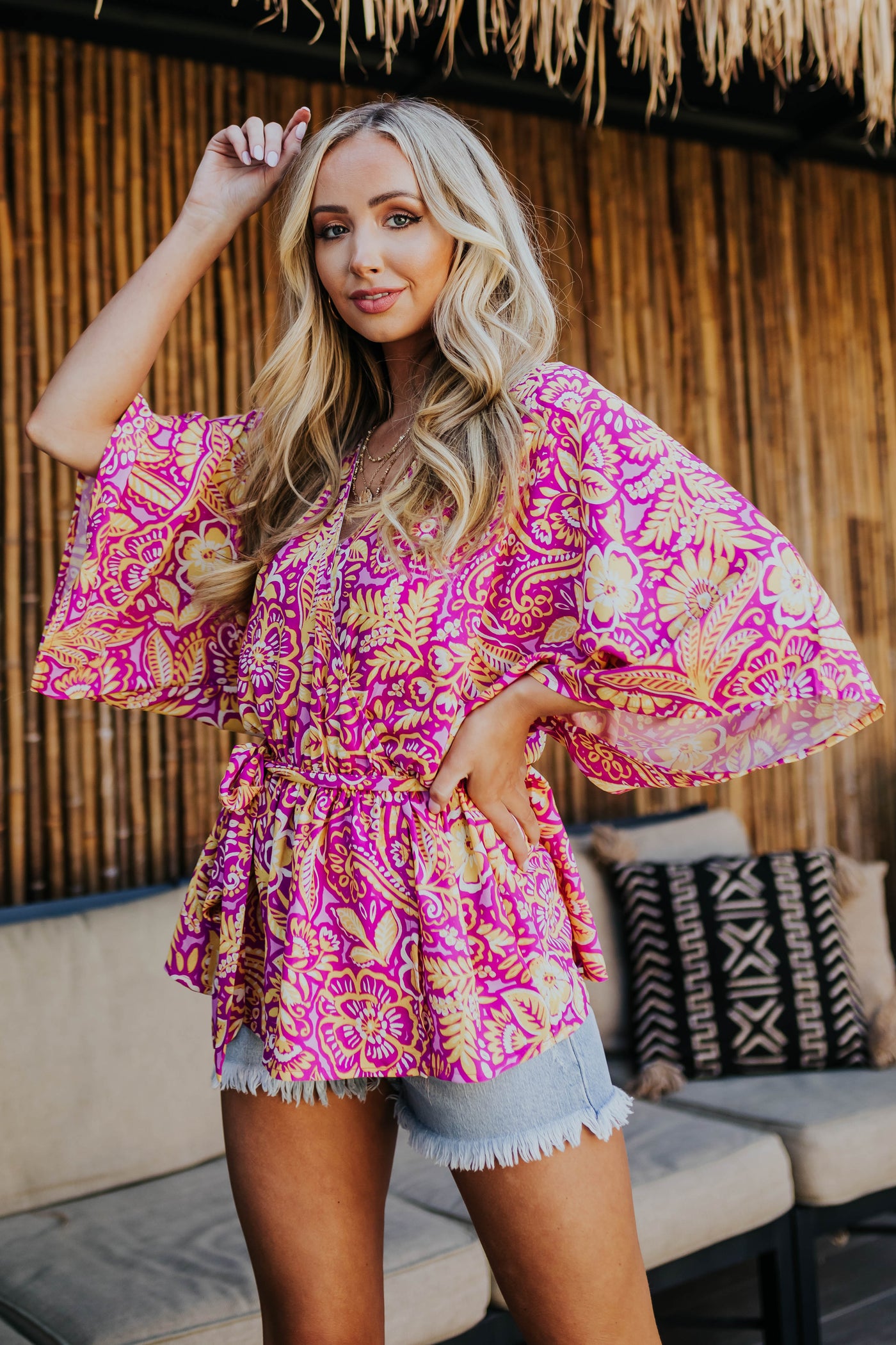 Magenta Printed Surplice Peplum Top with Waist Tie