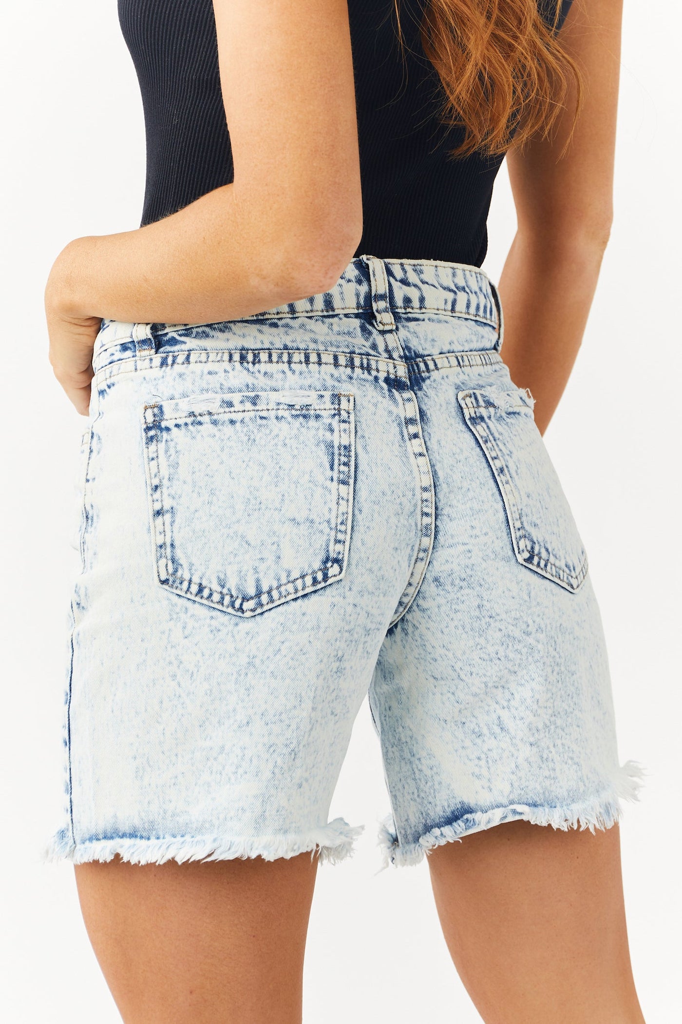 Medium Acid Wash High Rise Distressed Hem Shorts