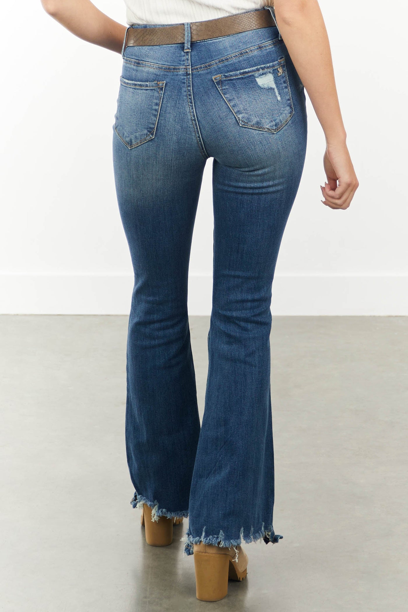 Medium High Rise Flare Cut Distressed Jeans