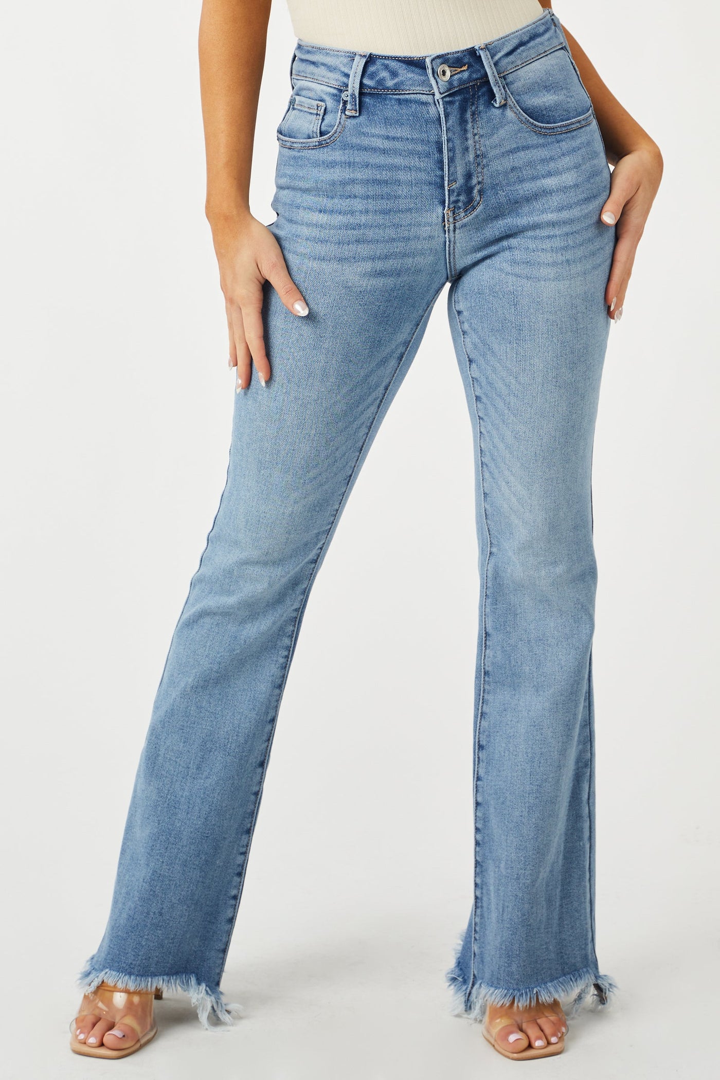 Medium Wash High Rise Raw Hem Bootleg Jeans