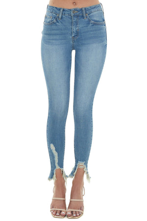 Medium Wash Ripped Hem Mid Rise Skinny Jeans