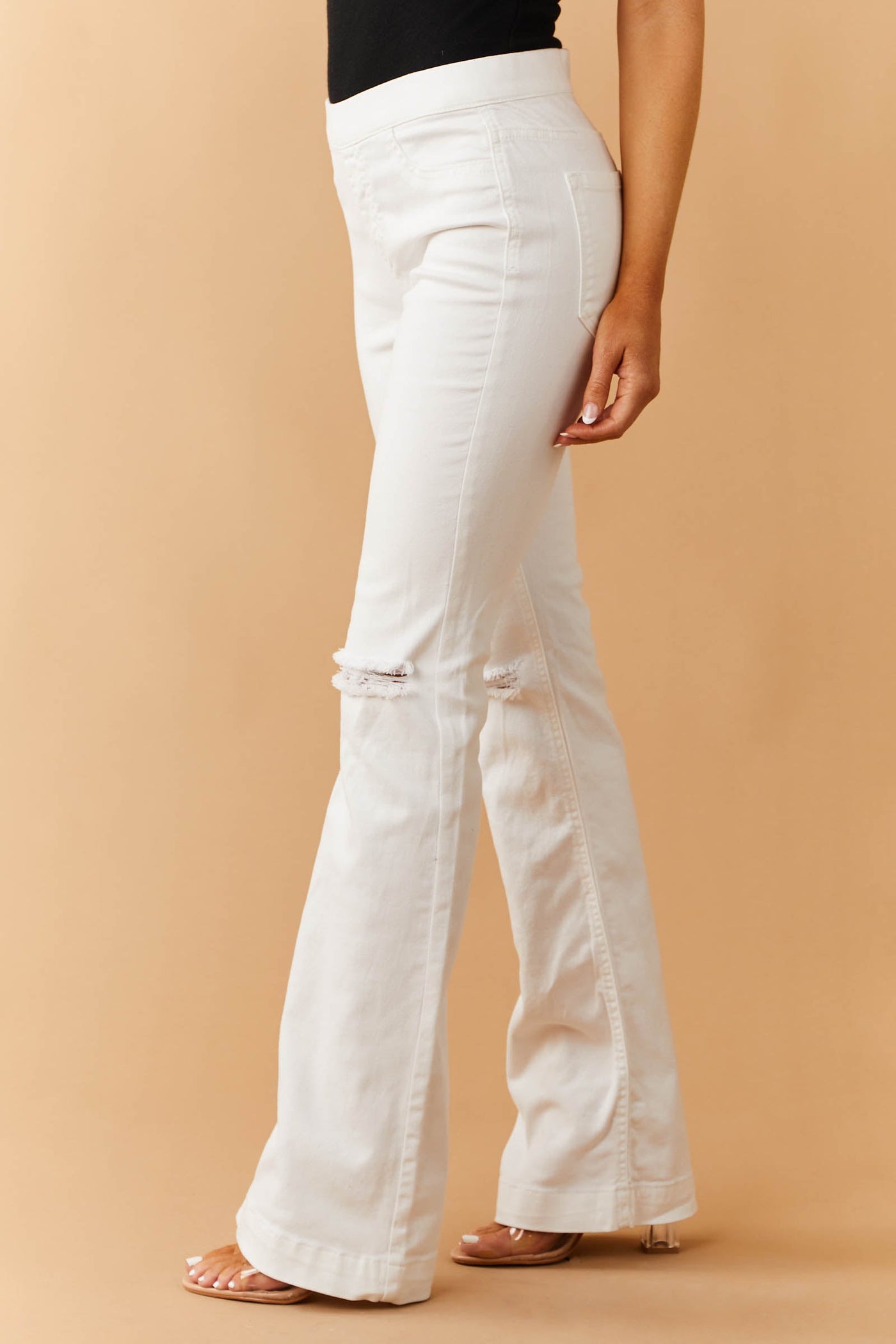 Off White Mid Rise Distressed Knee Jeggings