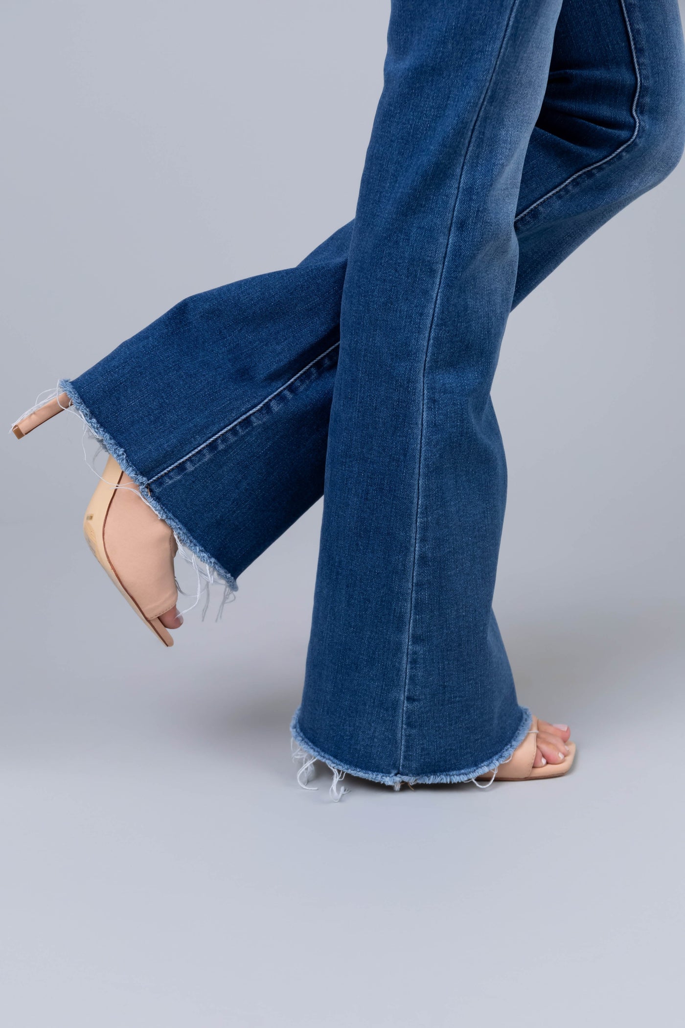 Vervet Medium Wash Mid Rise Raw Hem Jeans