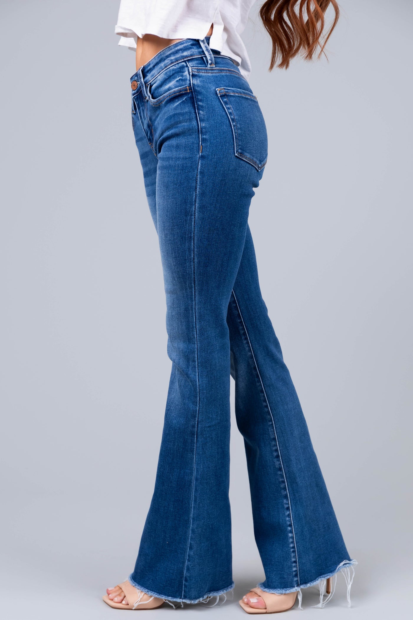 Vervet Medium Wash Mid Rise Raw Hem Jeans