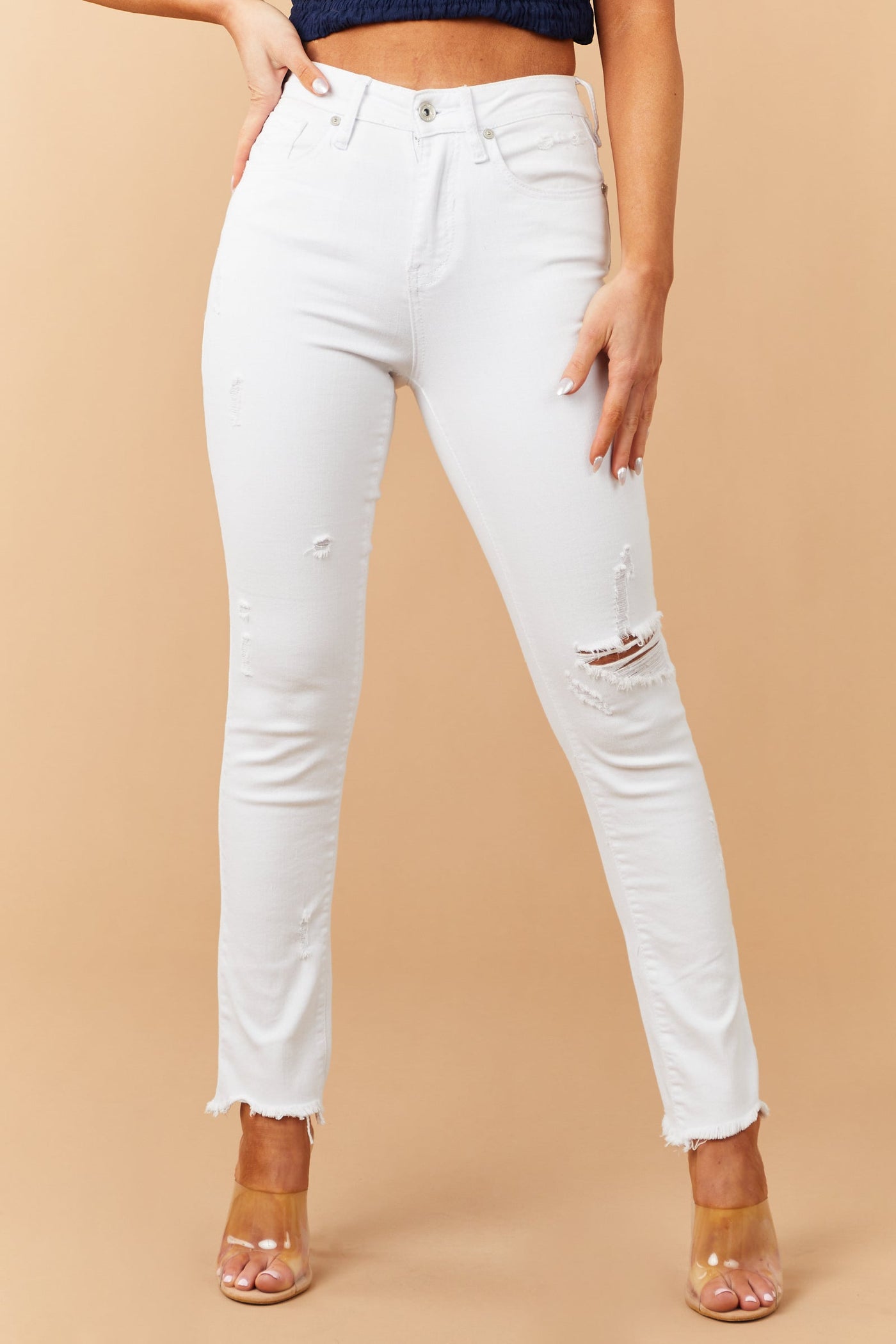 White High Rise Raw Hem Relaxed Skinny Jeans