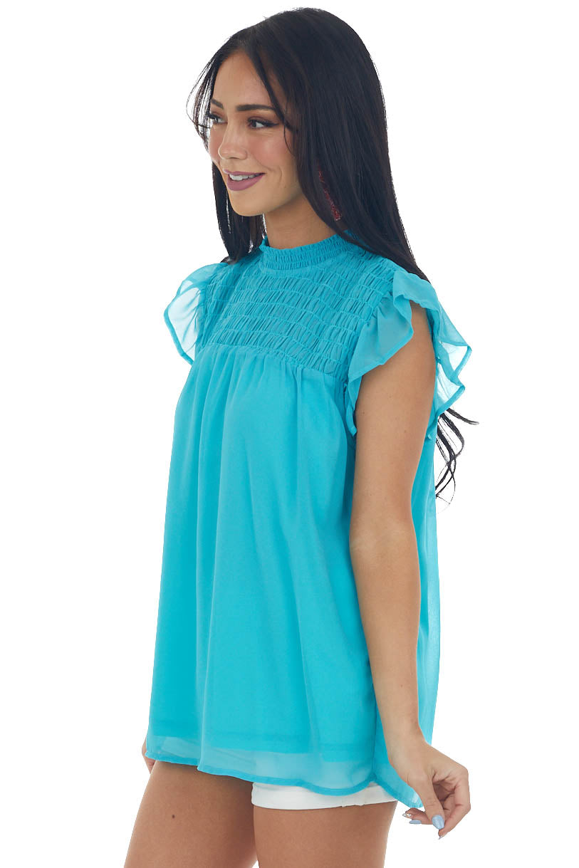 Aqua Smocked Yoke Ruffle Cap Sleeve Blouse