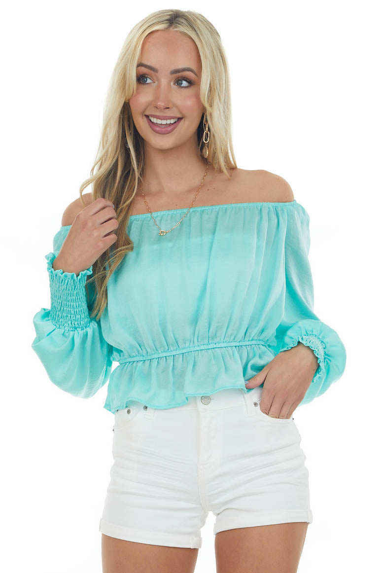 Aquamarine Silky Smocked Cuff Peplum Blouse