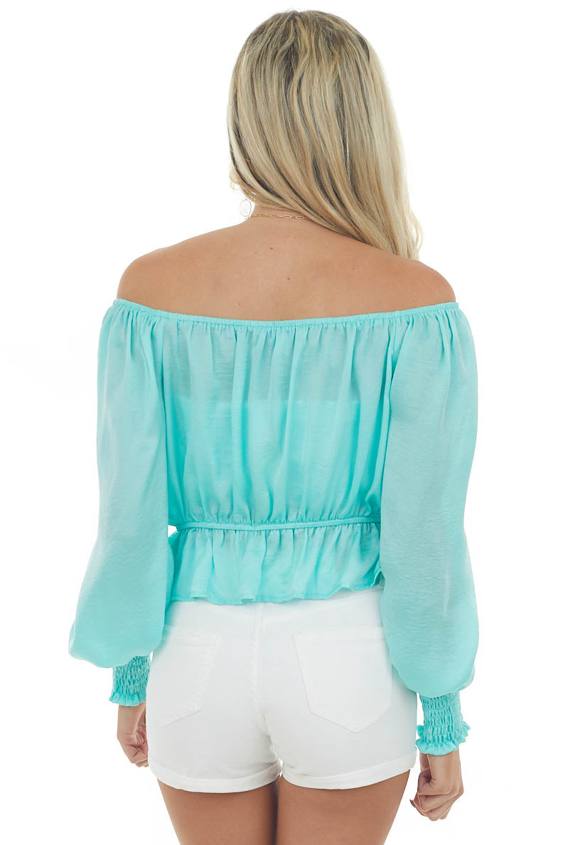 Aquamarine Silky Smocked Cuff Peplum Blouse