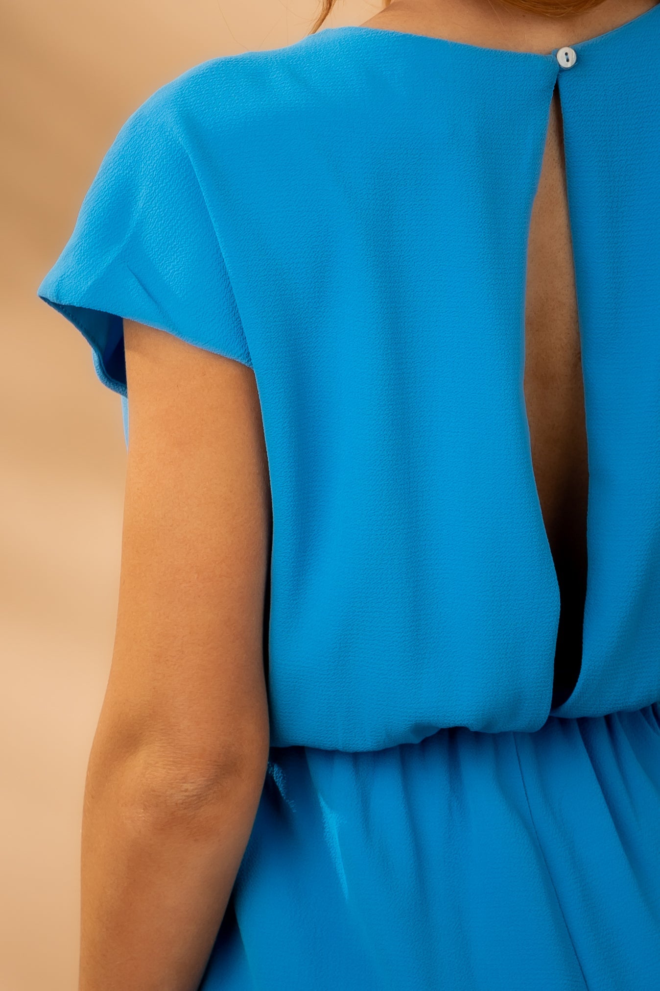 Azure V Neck Front Tie Woven Romper