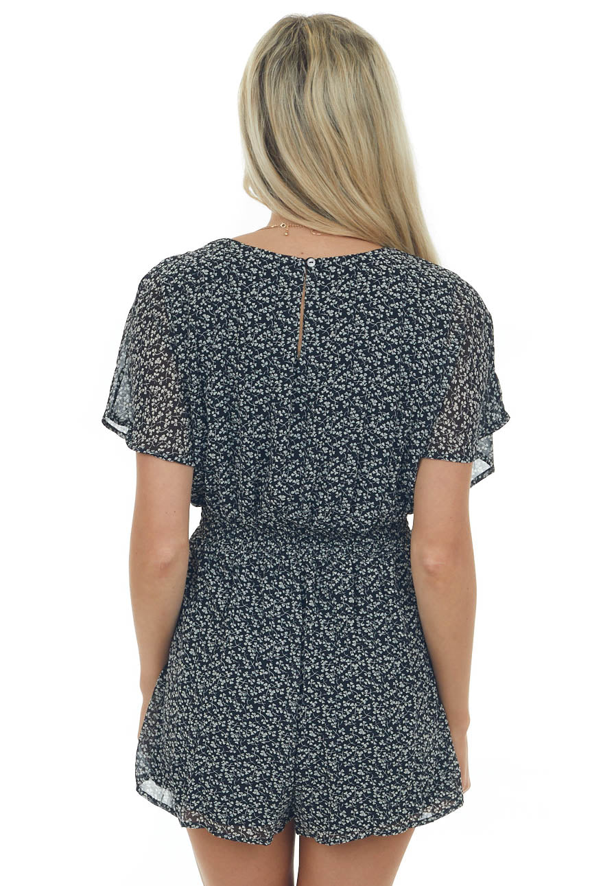 Black Clover Print Plunging V Neck Woven Romper
