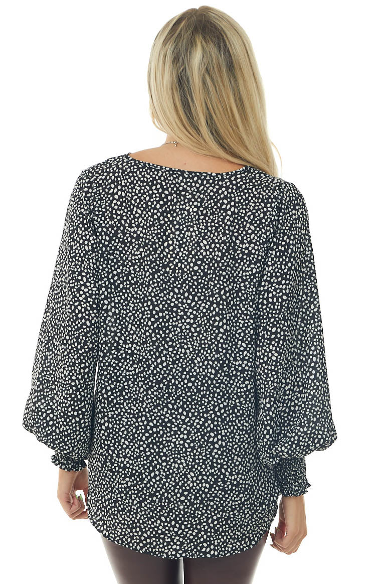 Black Dalmatian Surplice Bubble Hem Blouse