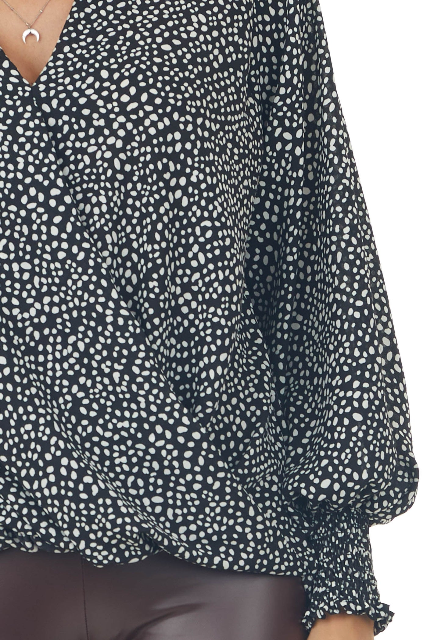 Black Dalmatian Surplice Bubble Hem Blouse