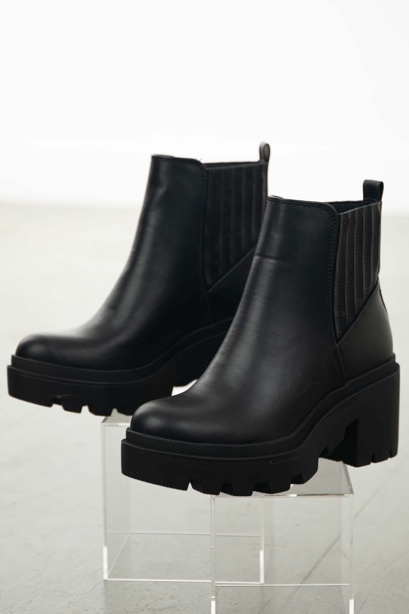 Black Faux Leather Slip On Heeled Lug Boots