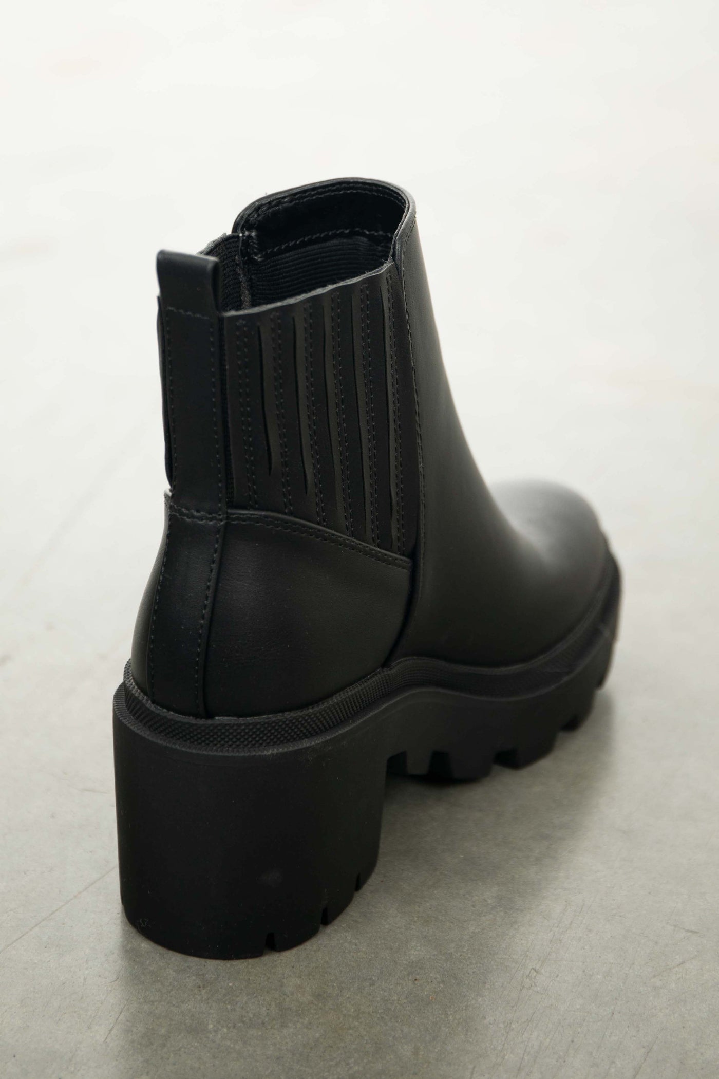 Black Faux Leather Slip On Heeled Lug Boots