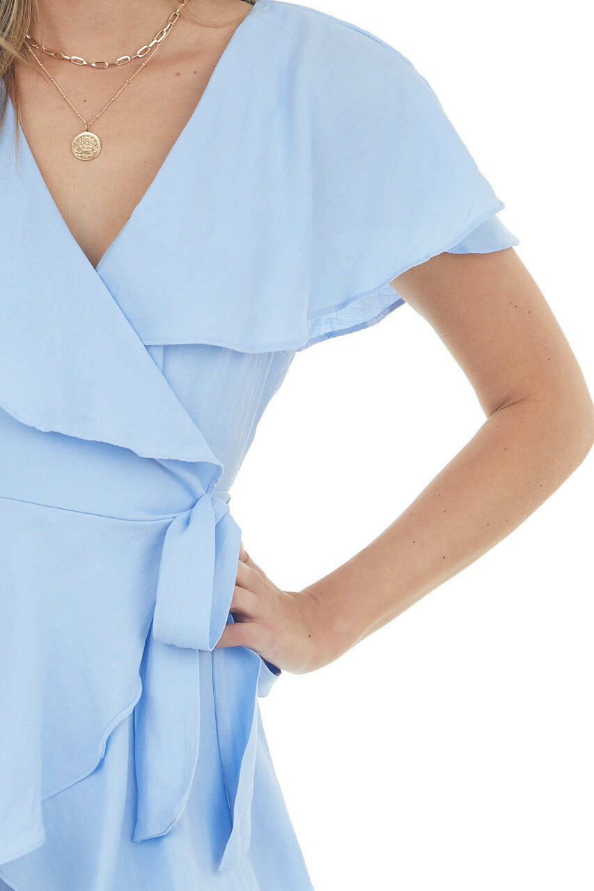 Cornflower Surplice Ruffle Open Back Romper