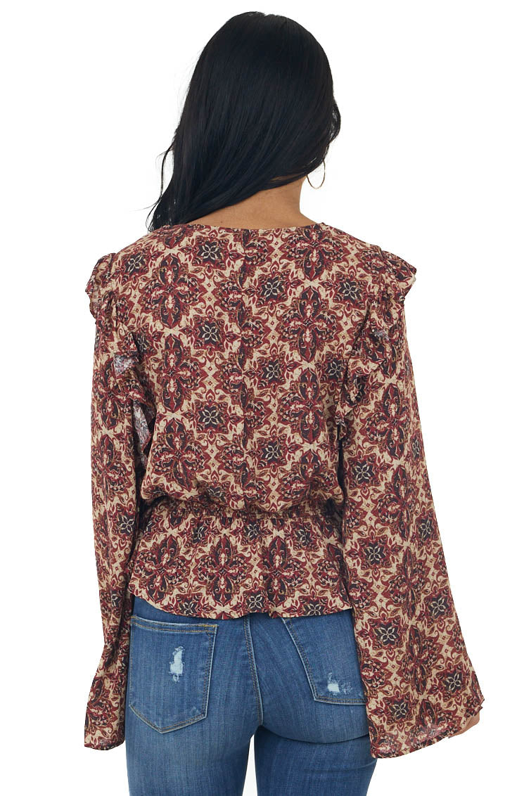 Cranberry Abstract Peplum Long Sleeve Top