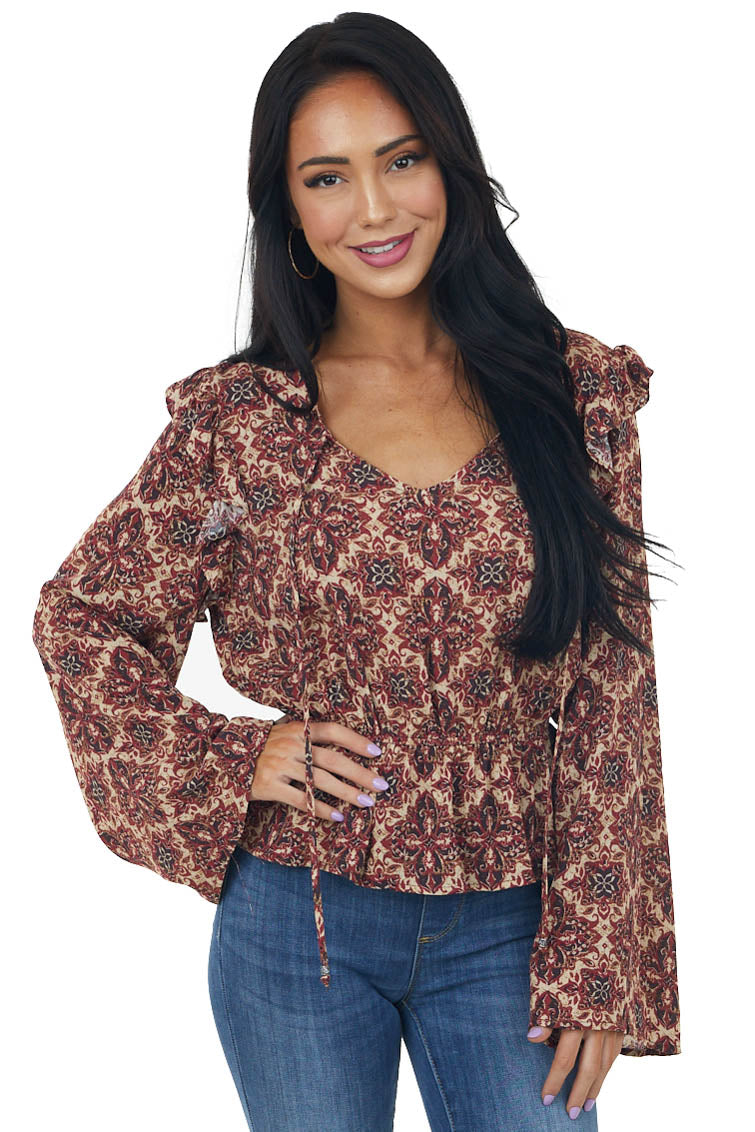 Cranberry Abstract Peplum Long Sleeve Top