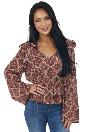 Cranberry Abstract Peplum Long Sleeve Top