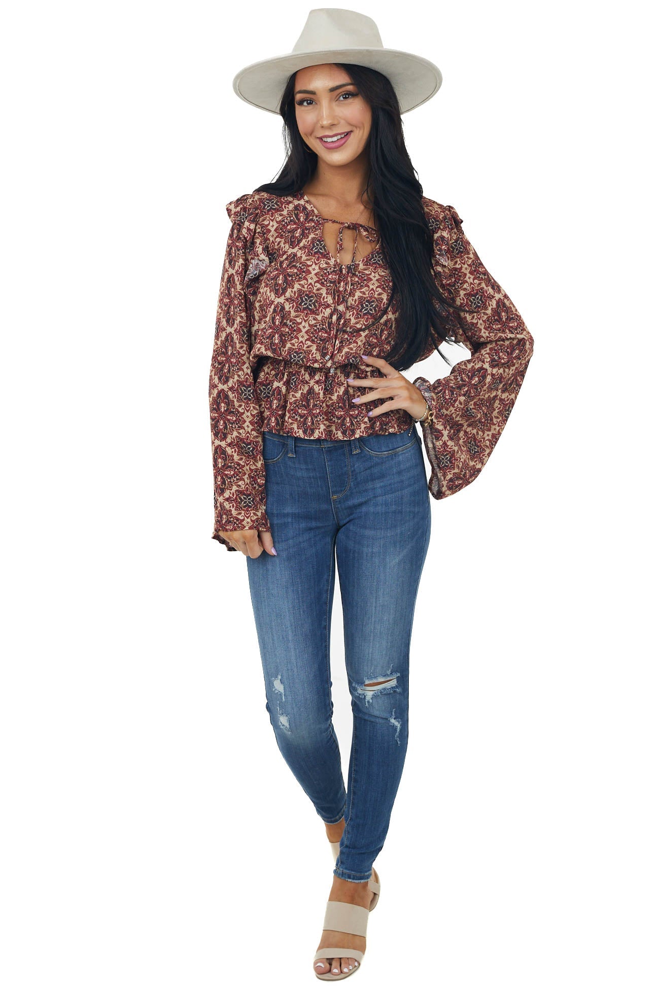 Cranberry Abstract Peplum Long Sleeve Top