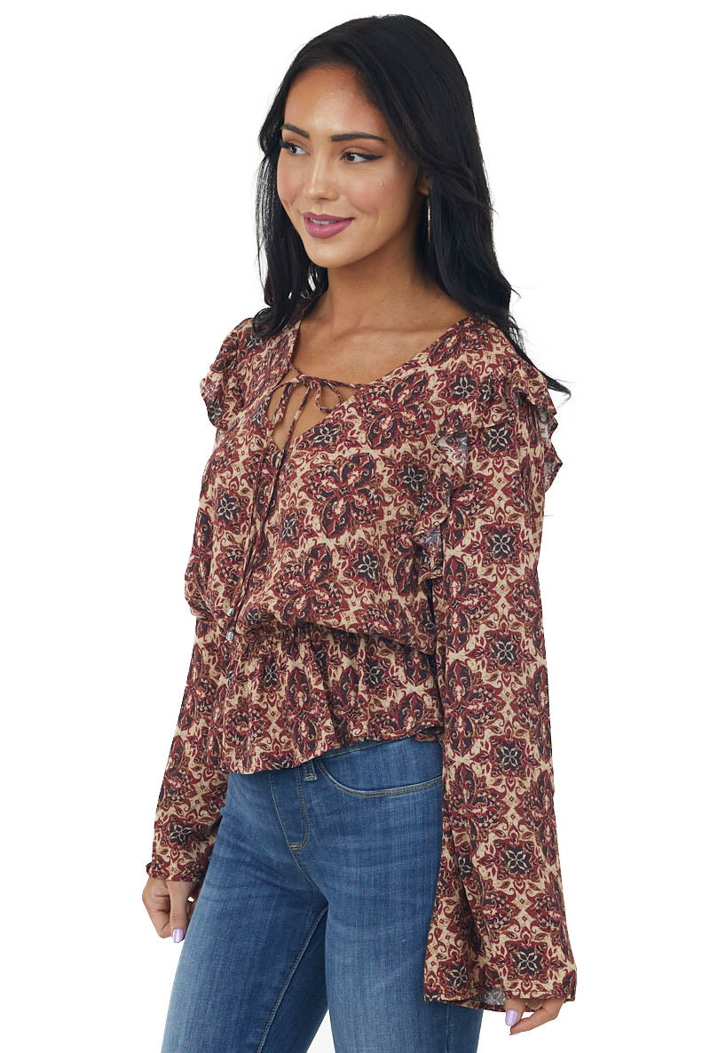 Cranberry Abstract Peplum Long Sleeve Top