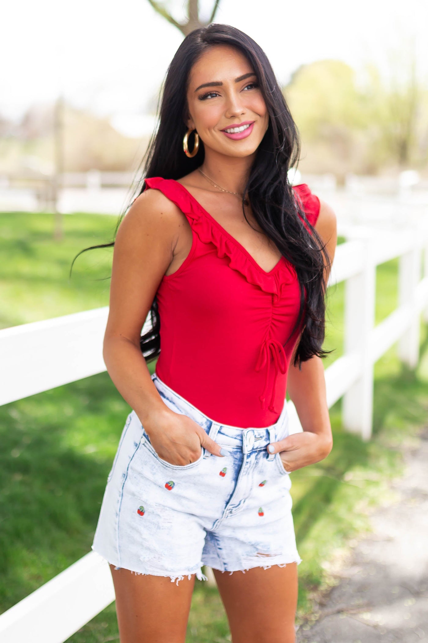 Cranberry Sleeveless Ruffle Detail Bodysuit