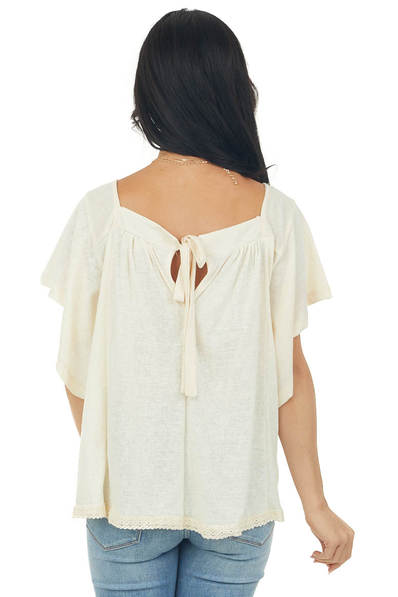 Cream Flutter Sleeve Knit Top with Lace Hem