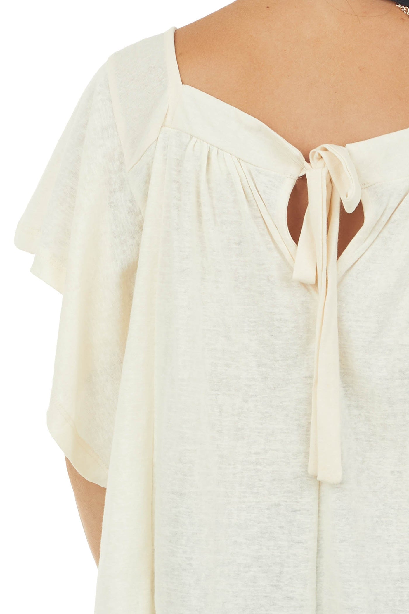 Cream Flutter Sleeve Knit Top with Lace Hem