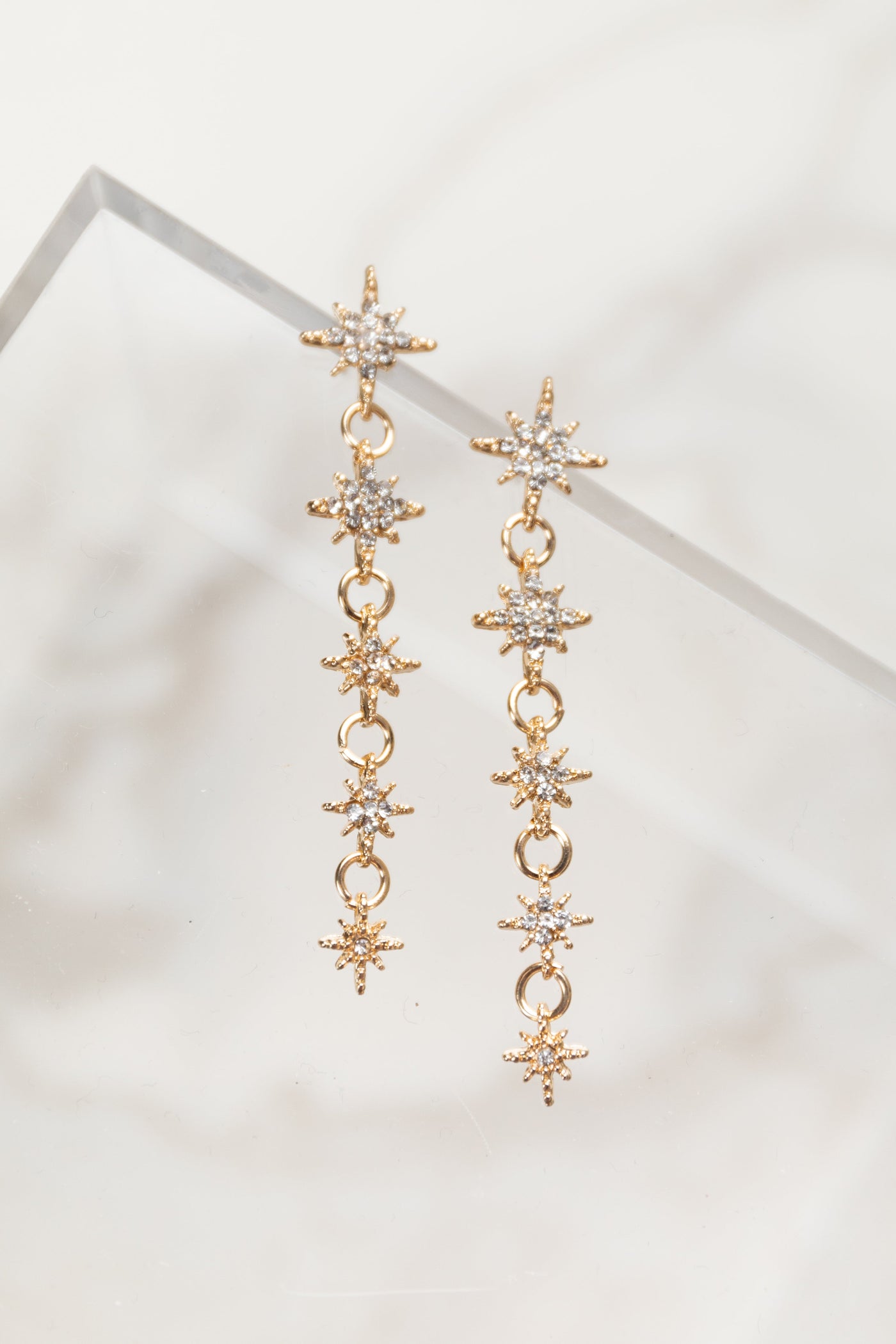 Gold Rhinestone Star Charm Dangle Earrings
