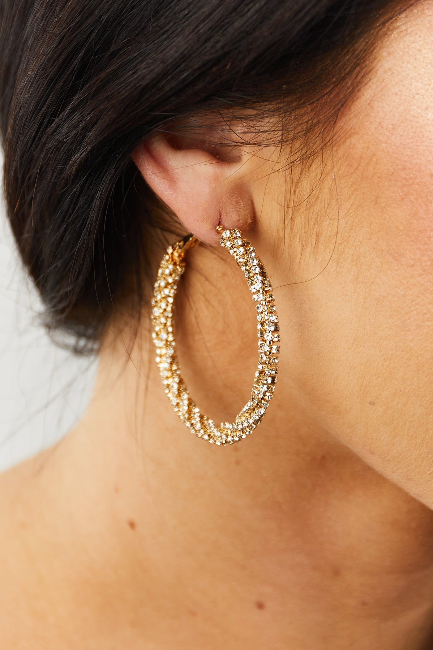 Gold and Rhinestone Twisting Hoop Earrings