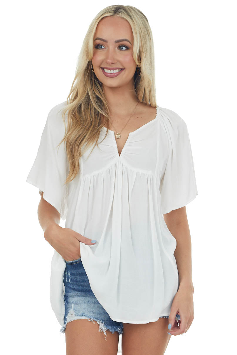 Ivory Notch Neck Flowy High Low Tunic Blouse