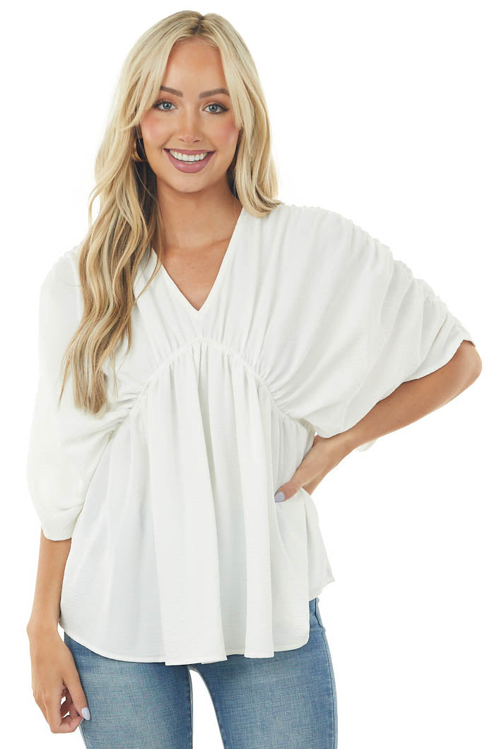 Ivory V Neck Half Sleeve Babydoll Flowy Blouse