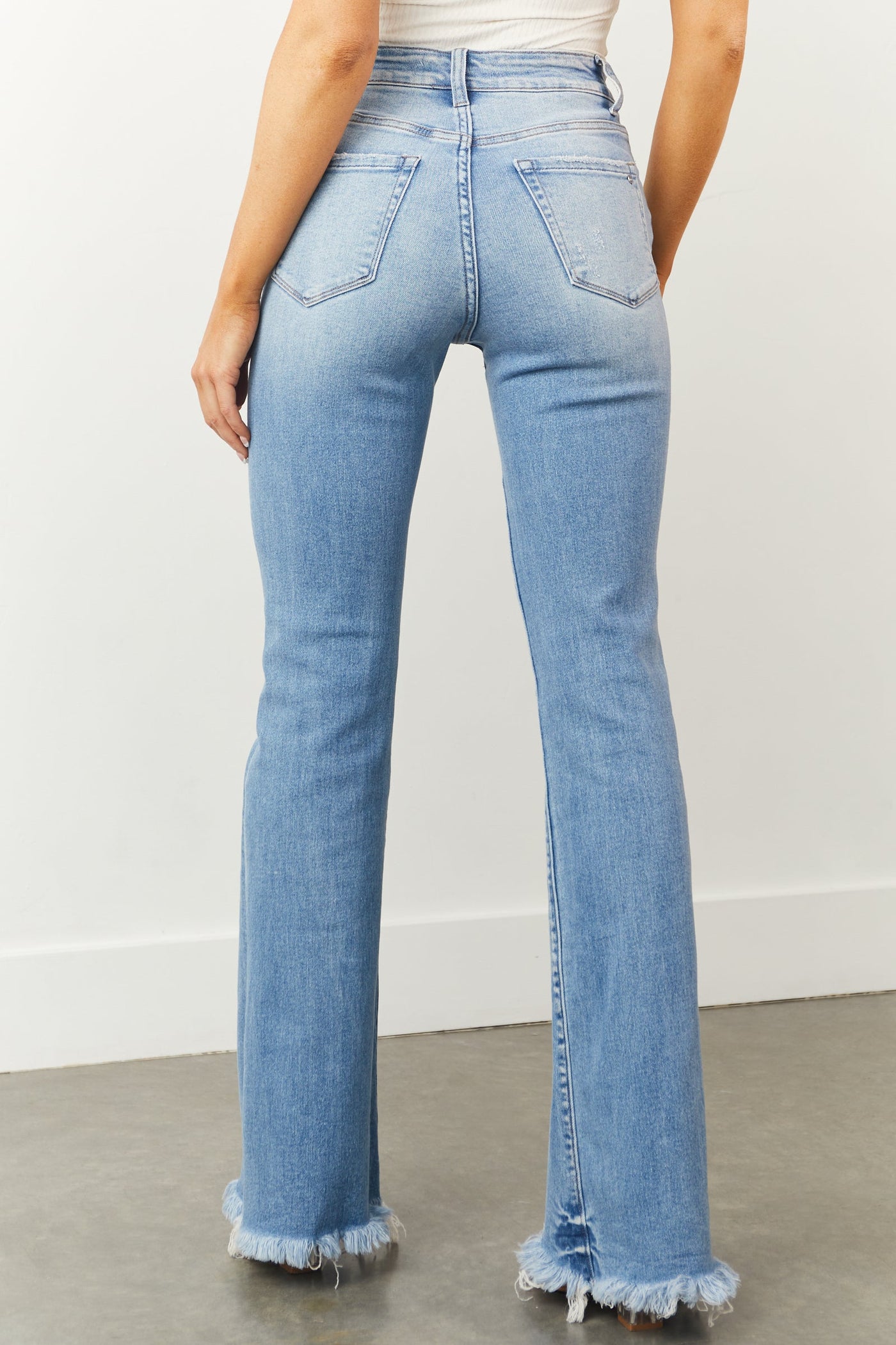 Light Wash High Rise Criss Cross Waist Flare Jeans