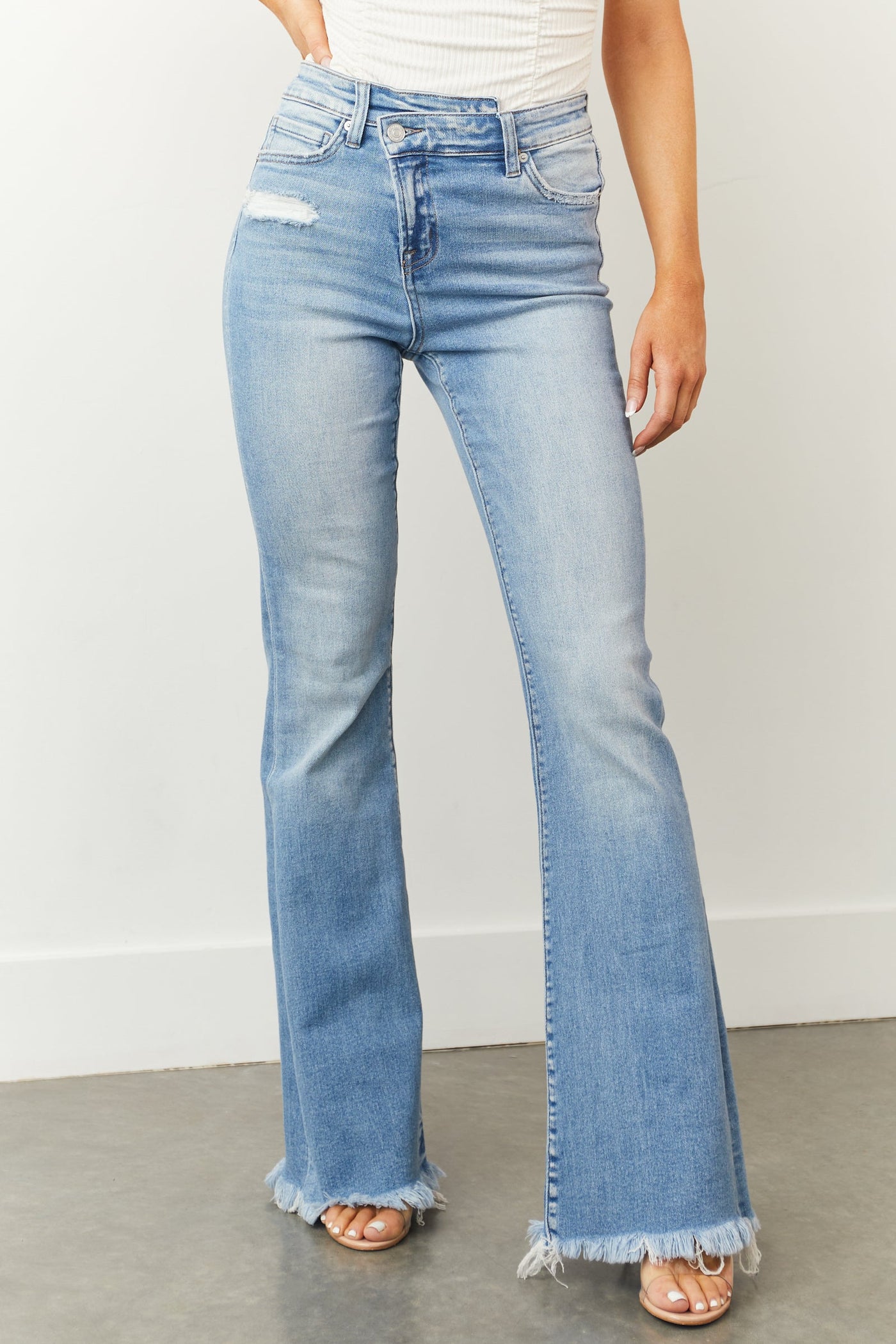 Light Wash High Rise Criss Cross Waist Flare Jeans