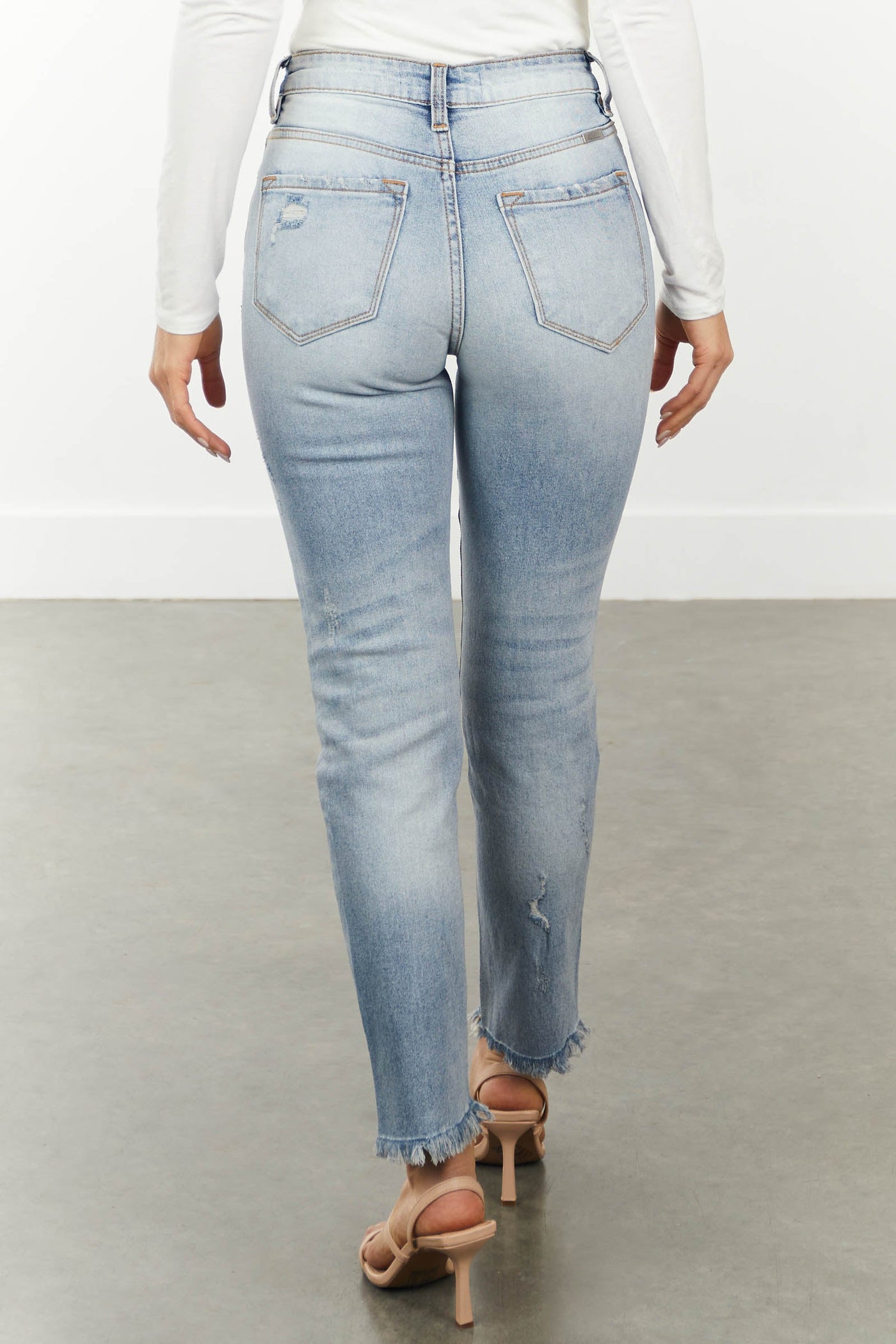 Light Wash Straight Leg Jeans with Frayed Hem