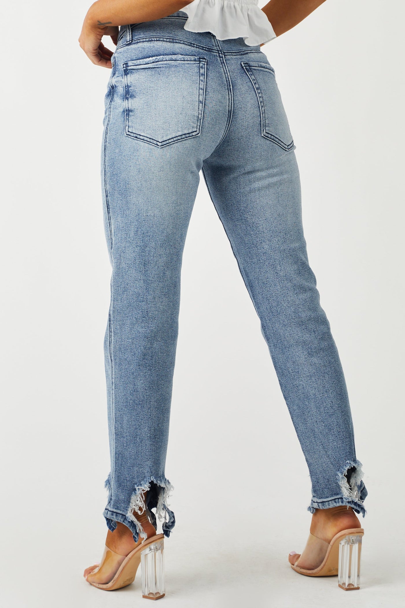 Medium Acid Wash Shark Bite Distressed Hem Jeans