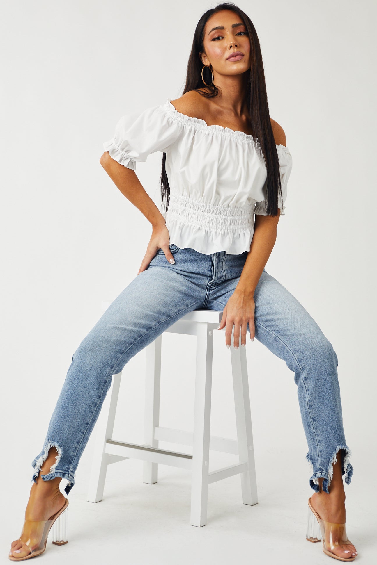 Medium Acid Wash Shark Bite Distressed Hem Jeans