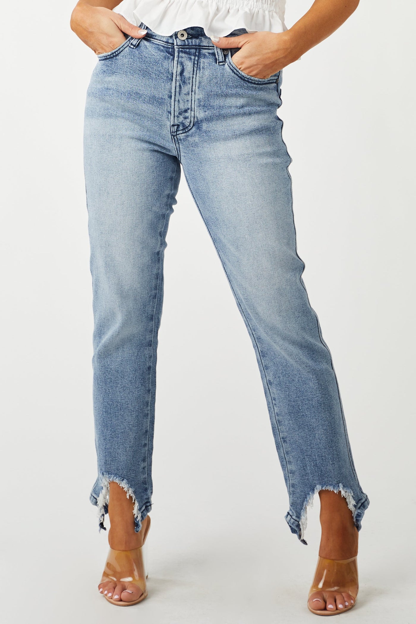 Medium Acid Wash Shark Bite Distressed Hem Jeans