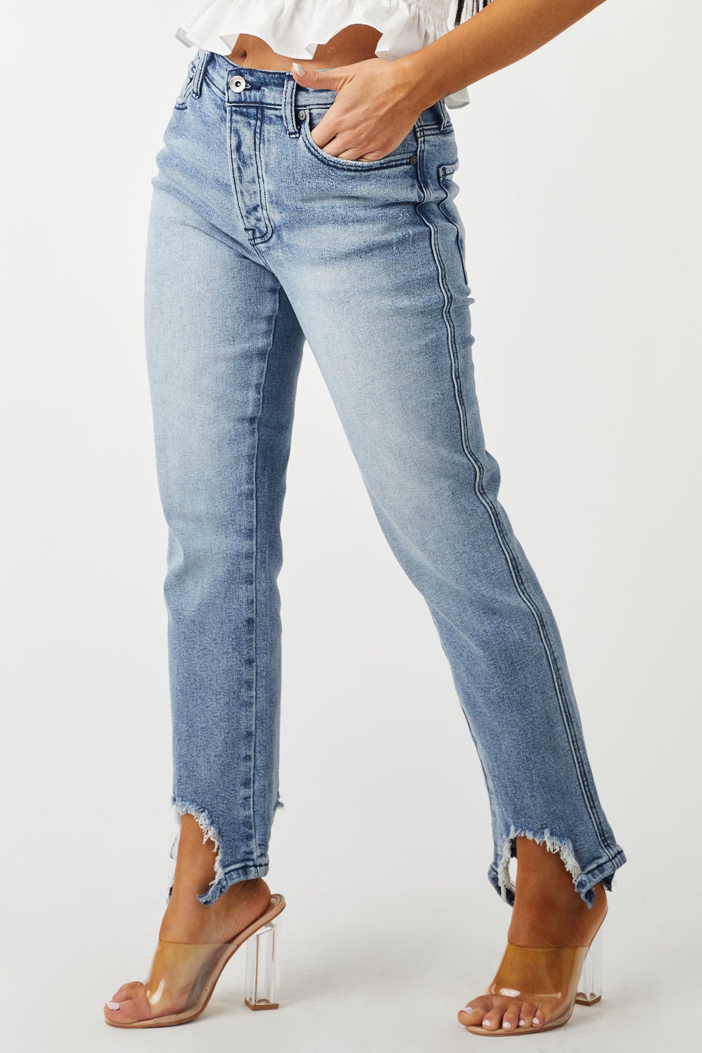 Medium Acid Wash Shark Bite Distressed Hem Jeans