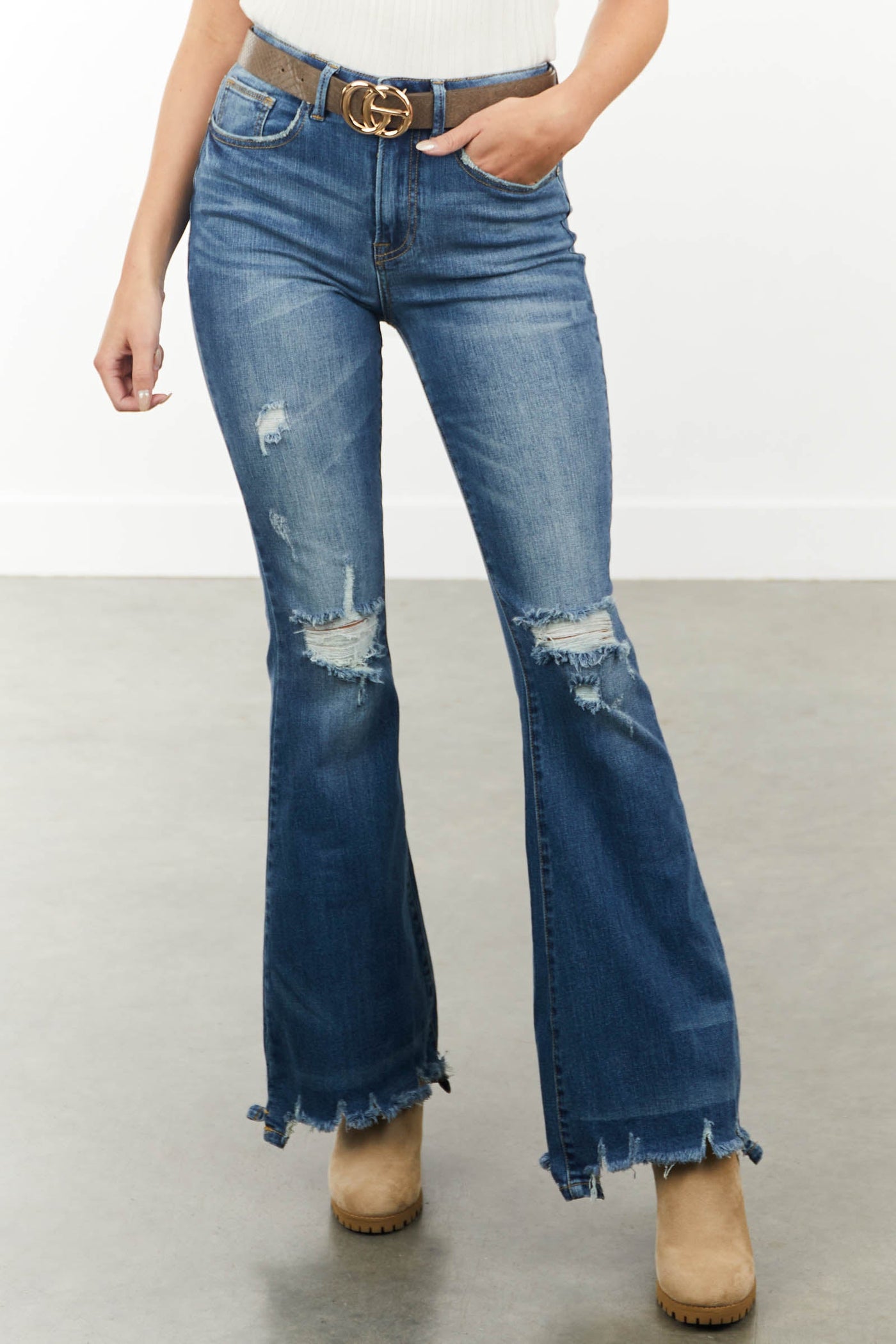 Medium High Rise Flare Cut Distressed Jeans
